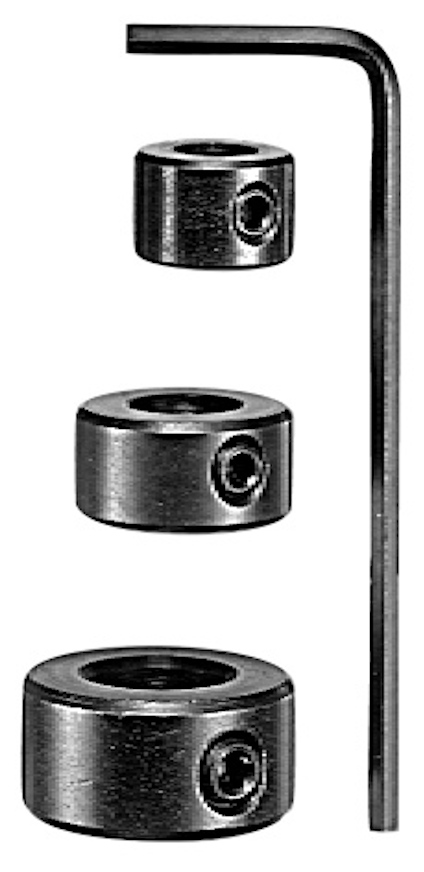 Tre runda metallhylsor och en L-formad insexnyckel i svart metall.