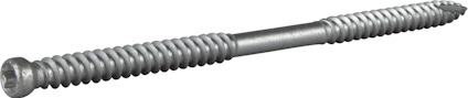En metallskruv med korrugerad gänga och en Torx-huvud. Skruven ligger horisontellt på en grå yta.