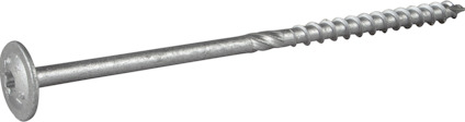 Metallisk skruv med rund bricka och gängad spets ligger på en grå yta, bredvid ett gulaktigt rektangulärt objekt.