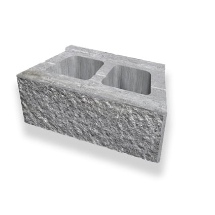 Rektangulär, grå mursten med två ihåliga sektioner och en texturerad yta.