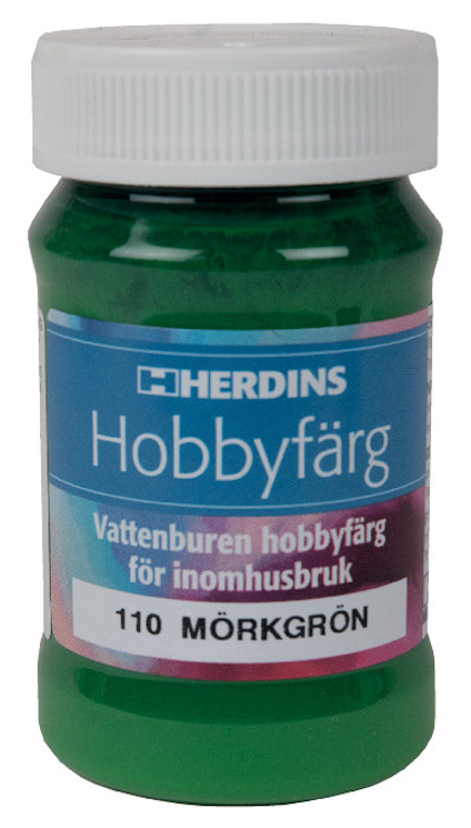 Grön flaska med etiketten "HERDINS Hobbyfärg Vattenburen hobbyfärg för inomhusbruk 110 MÖRKGRÖN".