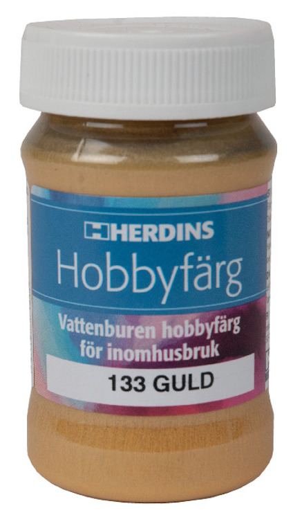 Hobbyfärgsburk med etikett "HERDINS Hobbyfärg, Vattenburen hobbyfärg för inomhusbruk, 133 GULD" och vit skruvlock.