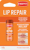 Förpackning av O'Keeffe's Lip Repair oparfymerad läppbalsam, 42g, med bild av läppexempel och text på svenska och engelska.