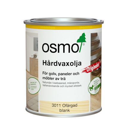 Plåtburk med hårdvaxolja, Osmo logotyp och text om användning för träytor.