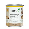 Plåtburk med Osmo hårdvaxolja, etikett innehåller text om produktens användning för inomhus träytor, med fokus på trägolv och möbler.