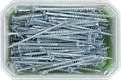 En låda med silverfärgade skruvar med stjärnformade huvuden.