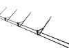 Svart metallkonstruktion med flera vertikala och horisontella stänger i ett geometriskt mönster.