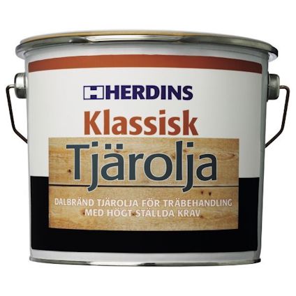 Burk med texten "Herdins Klassisk Tjärolja" och "Dalbränd tjärolja för träbehandling med högt ställda krav".