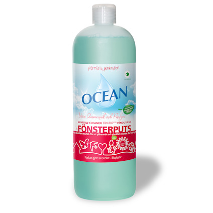 Flaska med grön vätska och etikett med texten "OCEAN FÖNSTERPUTS".