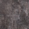 Mörk laminatyta med ojämnt mönster i grå och bruna nyanser.