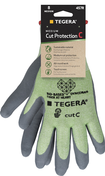 Grön handske med grå syntetbeläggning, etikett med text: "TEGERA Medium Cut Protection C".