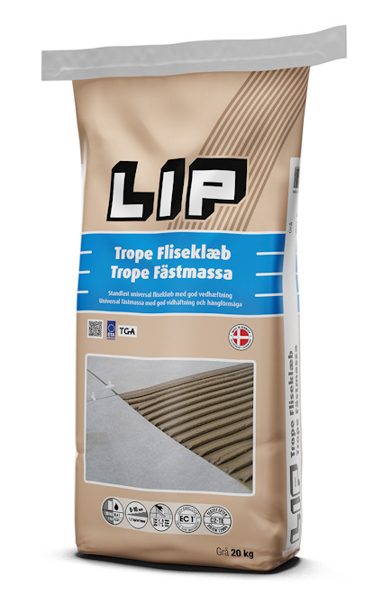 Förpackning med fästmassa med texten "LIP Trope Fliseklæb Trope Fästmassa Grå 20 kg" och bild på applicerad massa.