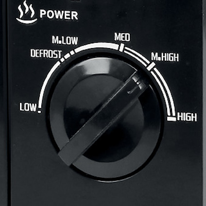 Svart ratt med texten "Power"; positioner: Defrost, M. Low, Med, M. High, High, Low.