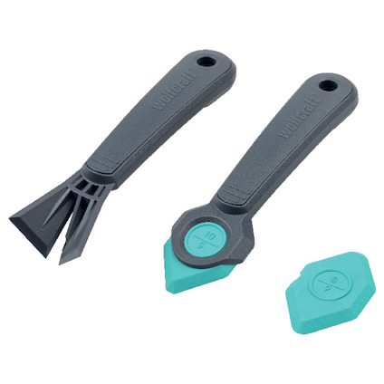 Två plastverktyg med gröna silikonytor och utbytbara blad, märkta "wolfcraft".